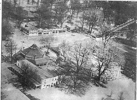 Black and white aerial of building at lake contrary